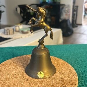 Vintage solid brass unicorn bell